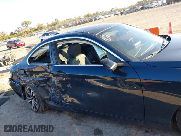 2015 BMW 2 Series 228i with VIN WBA1F5C53FV257153, listed as a IAAI auction lot 41294335 with 99,919 mi miles. Bid and sale history available at carsss.com. Image 14.
