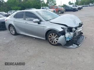 2019 Toyota Camry LE z VIN 4T1B11HK1KU248251, wystawiony jako IAAI lot #41878451 z przebiegiem 111 165 mil mil oraz . Historia ofert i sprzedaży dostępna na DreamBid. Obrazek 1.