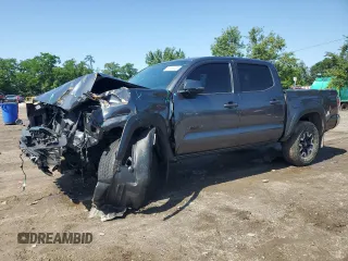 2022 Toyota Tacoma SR with VIN 3TMCZ5ANXNM517997, listed as a Copart auction lot 61160455 with 51,573 mi miles and Salvage title. Bid and sale history available at DreamBid. Image 1.