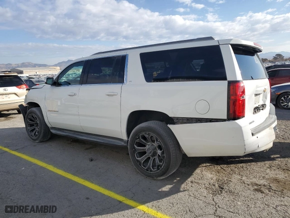2018 Chevrolet Suburban LT with VIN 1GNSCHKC2JR102152, listed as a Copart auction lot 42367785 with 156,006 mi miles and Salvage Title. Bid and sale history available at carsss.com. Image 2.