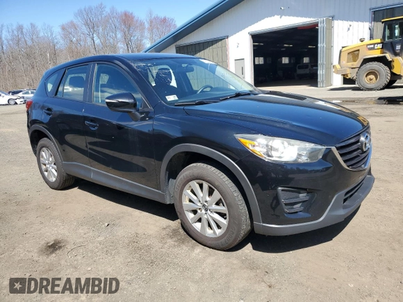 2016 Mazda CX-5 Sport with VIN JM3KE4BY8G0749246, listed as a Copart auction lot 52644655 with 117,753 mi miles and Clean Title. Bid and sale history available at carsss.com. Image 4.