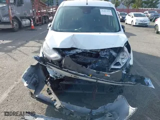2020 Ford Transit Connect Van XLT with VIN NM0LS7F22L1465254, listed as a IAAI auction lot 41407923 with 63,311 mi miles. Bid and sale history available at carsss.com. Image 6.