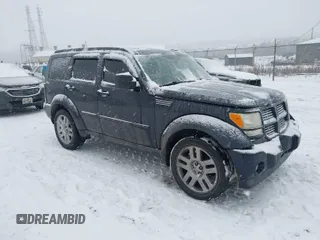 2011 Dodge Nitro Heat with VIN 1D4PU4GK0BW576840, listed as a IAAI auction lot 41318203 with 91,118 mi miles. Bid and sale history available at carsss.com. Image 1.