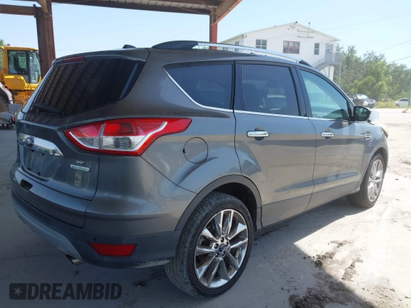 2014 Ford Escape SE z VIN 1FMCU0G97EUE34174, wystawiony jako IAAI lot #42274846 z przebiegiem 121 801 mil mil oraz . Historia ofert i sprzedaży dostępna na DreamBid. Obrazek 4.