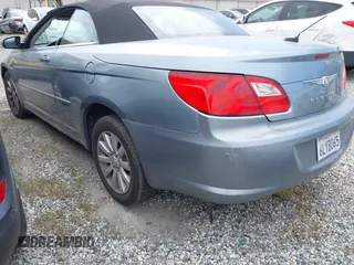 2010 Chrysler Sebring Touring with VIN 1C3BC5ED5AN187589, listed as a IAAI auction lot 42014513 with 114,044 mi miles and . Bid and sale history available at DreamBid. Image 3.