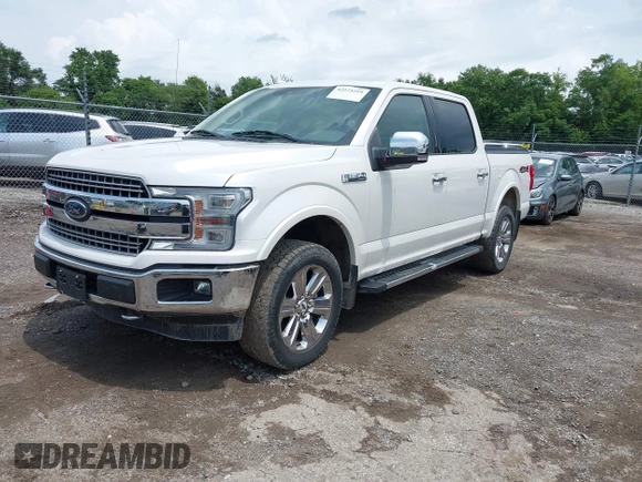 2018 Ford F-150 XL with VIN 1FTEW1EG7JKE76476, listed as a IAAI auction lot 42575219 with 183,308 mi miles and . Bid and sale history available at DreamBid. Image 2.