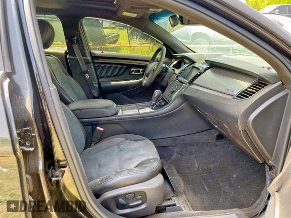 2013 Ford Taurus SHO z VIN 1FAHP2KT6DG144172, wystawiony jako Copart lot #54102495 z przebiegiem Nie podano mil oraz Czysty tytuł • Clean title. Historia ofert i sprzedaży dostępna na DreamBid. Obrazek 5.