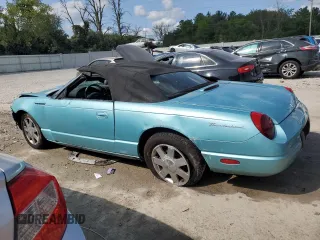 2002 Ford Thunderbird Hardtop Premium z VIN 1FAHP60A52Y128979, wystawiony jako Copart lot #68105854 z przebiegiem 58 146 mil mil oraz Nie do naprawy • Non repairable. Historia ofert i sprzedaży dostępna na DreamBid. Obrazek 2.