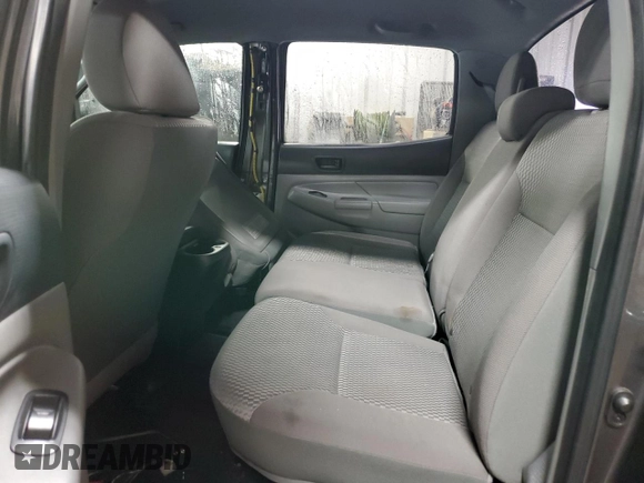 2014 Toyota Tacoma with VIN 5TFLU4ENXEX089927, listed as a Copart auction lot 52140565 with 112,924 mi miles and Salvage Title. Bid and sale history available at DreamBid. Image 10.