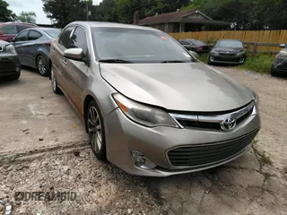 2013 Toyota Avalon XLE z VIN 4T1BK1EB6DU065481, wystawiony jako IAAI lot #42299194 z przebiegiem 220 763 mil mil oraz . Historia ofert i sprzedaży dostępna na DreamBid. Obrazek 1.