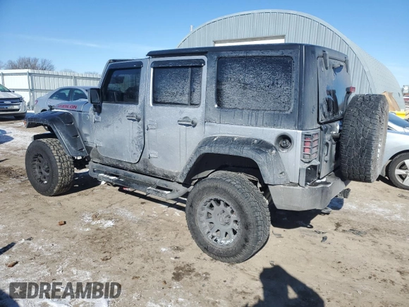 2015 Jeep Wrangler Unlimited Rubicon with VIN 1C4BJWFG2FL515084, listed as a Copart auction lot 41870545 with 114,046 mi miles and Salvage Title. Bid and sale history available at carsss.com. Image 2.