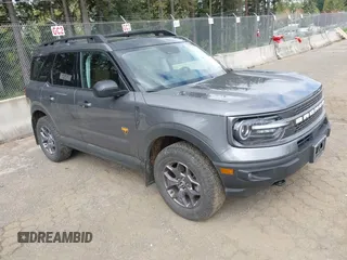 2022 Ford Bronco Sport Badlands z VIN 3FMCR9D91NRE10776, wystawiony jako IAAI lot #42087434 z przebiegiem 58 695 mil mil oraz . Historia ofert i sprzedaży dostępna na DreamBid. Obrazek 1.