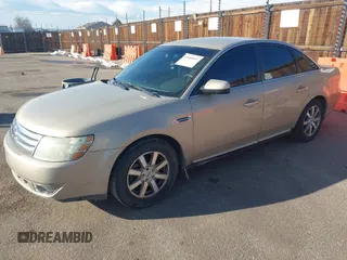 2008 Ford Taurus SEL with VIN 1FAHP24W38G111319, listed as a IAAI auction lot 41585092 with 216,419 mi miles. Bid and sale history available at carsss.com. Image 2.