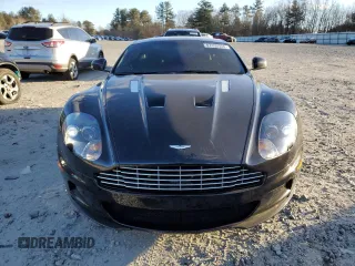 2012 Aston Martin DBS z VIN SCFFBCBD0CGE03238, wystawiony jako Copart lot #87450334 z przebiegiem 89 666 mil mil oraz Tytuł czysty. Historia ofert i sprzedaży dostępna na DreamBid. Obrazek 5.