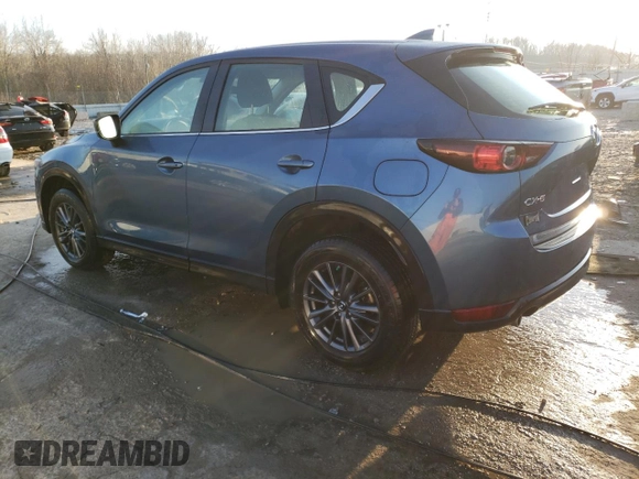 2021 Mazda CX-5 Sport with VIN JM3KFABM1M0406640, listed as a Copart auction lot 85698624 with 31,267 mi miles and Salvage Title. Bid and sale history available at carsss.com. Image 2.