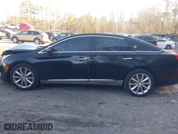 2013 Cadillac XTS Premium z VIN 2G61S5S38D9199459, wystawiony jako IAAI lot #41787638 z przebiegiem 171 298 mil mil oraz . Historia ofert i sprzedaży dostępna na DreamBid. Obrazek 14.