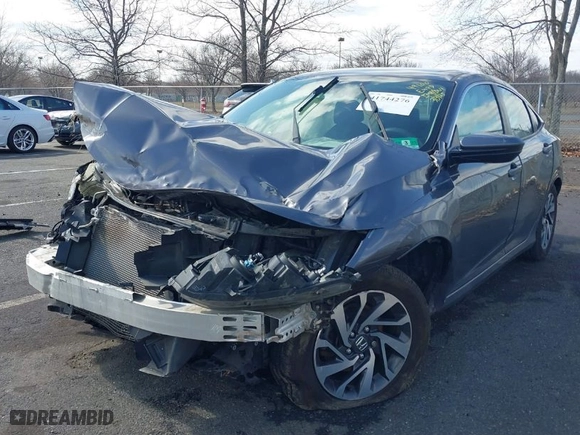 2016 Honda Civic Sedan EX with VIN 2HGFC2F72GH509547, listed as a IAAI auction lot 41744276 with 124,084 mi miles. Bid and sale history available at carsss.com. Image 2.