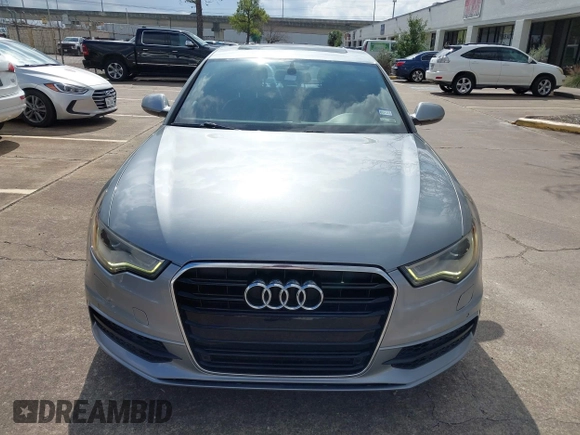 2013 Audi A6 3.0T Prestige with VIN WAUHGAFC4DN126258, listed as a IAAI auction lot 41512291 with 123,298 mi miles. Bid and sale history available at carsss.com. Image 13.