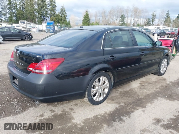 2010 Toyota Avalon XL with VIN 4T1BK3DB1AU356186, listed as a IAAI auction lot 41704838 with 150,462 mi miles and . Bid and sale history available at carsss.com. Image 4.