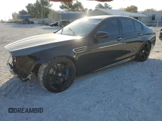 2015 BMW M5 with VIN WBSFV9C52FD594673, listed as a Copart auction lot 77460894 with 131,755 mi miles and Clean Title. Bid and sale history available at carsss.com. Image 1.