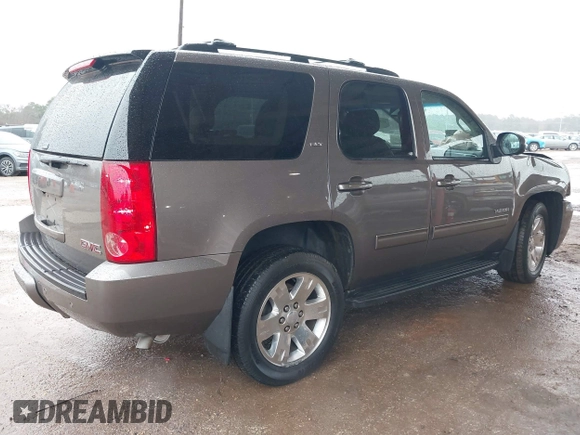 2014 GMC Yukon SLT with VIN 1GKS1CE00ER164663, listed as a IAAI auction lot 41547771 with 178,998 mi miles. Bid and sale history available at carsss.com. Image 4.
