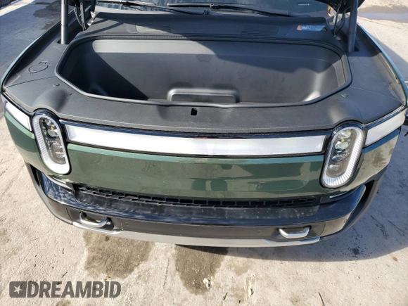 2024 Rivian R1S Adventure with VIN 7PDSGCBA5RN042135, listed as a Copart auction lot 42229865 with 107 mi miles and Salvage Title. Bid and sale history available at carsss.com. Image 12.