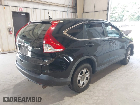 2013 Honda CR-V LX with VIN 2HKRM4H37DH676133, listed as a IAAI auction lot 42586988 with 171,256 mi miles and . Bid and sale history available at DreamBid. Image 4.
