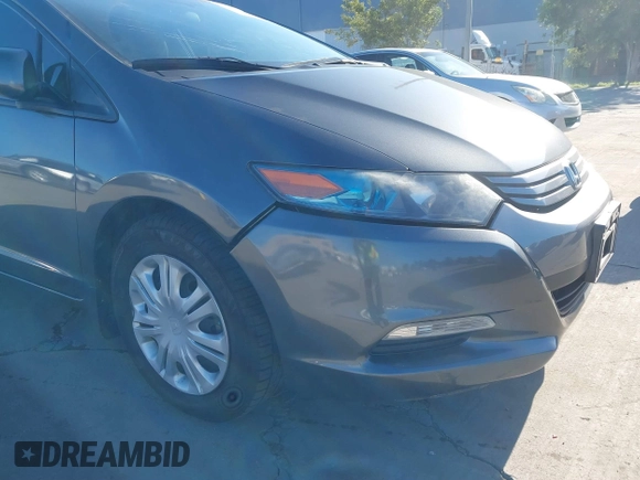 2010 Honda Insight LX with VIN JHMZE2H50AS019740, listed as a IAAI auction lot 41665527 with 74,022 mi miles and . Bid and sale history available at DreamBid. Image 17.