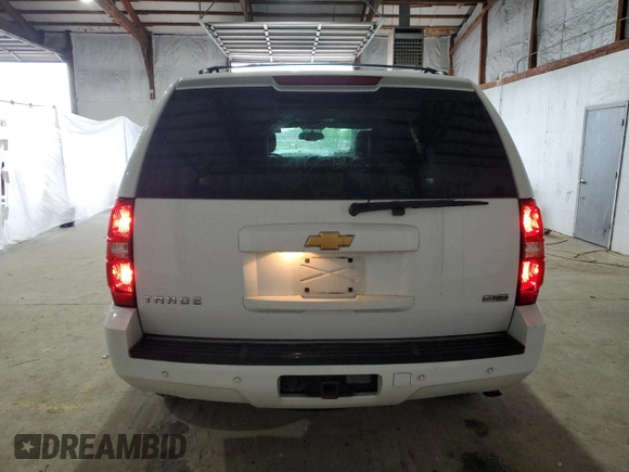 2012 Chevrolet Tahoe LT z VIN 1GNSKBE06CR157112, wystawiony jako Copart lot #55932895 z przebiegiem 185 934 mil mil oraz Szkoda całkowita • Salvage title. Historia ofert i sprzedaży dostępna na DreamBid. Obrazek 6.