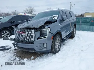 2021 GMC Yukon Denali with VIN 1GKS2DKL8MR216007, listed as a IAAI auction lot 41246785 with 83,058 mi miles. Bid and sale history available at carsss.com. Image 12.