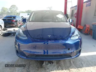 2022 Tesla Model Y Long Range z VIN 7SAYGAEE2NF364733, wystawiony jako IAAI lot #42290231 z przebiegiem 33 907 mil mil oraz . Historia ofert i sprzedaży dostępna na DreamBid. Obrazek 12.