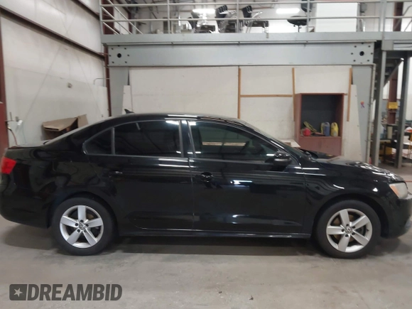 2014 Volkswagen Jetta SE with VIN 3VWD17AJ7EM409189, listed as a IAAI auction lot 42313804 with 139,950 mi miles and . Bid and sale history available at DreamBid. Image 13.