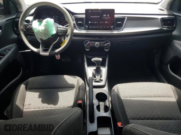2023 Kia Rio LX with VIN 3KPA24AD3PE577081, listed as a Copart auction lot 54427095 with 18,292 mi miles and Non Repairable. Bid and sale history available at DreamBid. Image 8.