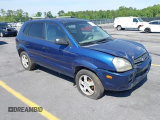 2005 Hyundai Tucson GL with VIN KM8JM12B85U233228, listed as a IAAI auction lot 42051627 with 170,742 mi miles. Bid and sale history available at carsss.com. Image 1.