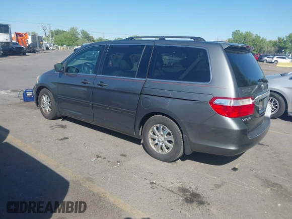 2007 Honda Odyssey EX-L with VIN 5FNRL38777B140916, listed as a IAAI auction lot 42159976 with 167,541 mi miles. Bid and sale history available at carsss.com. Image 3.
