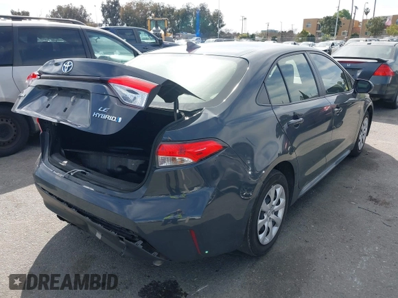 2023 Toyota Corolla Hybrid LE with VIN JTDBCMFE8P3023738, listed as a IAAI auction lot 41765597 with 59,938 mi miles. Bid and sale history available at carsss.com. Image 4.