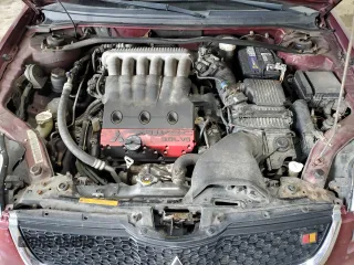 2007 Mitsubishi Galant Ralliart z VIN 4A3AB76T67E034592, wystawiony jako Copart lot #72078104 z przebiegiem 206 481 mil mil oraz Szkoda całkowita • Salvage title. Historia ofert i sprzedaży dostępna na DreamBid. Obrazek 11.