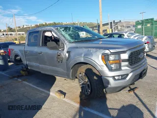 2023 Ford F-150 XL with VIN 1FTFW1E55PKD57059, listed as a IAAI auction lot 41625898 with 49,882 mi miles. Bid and sale history available at carsss.com. Image 1.