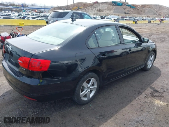 2012 Volkswagen Jetta Sedan TDI w/Premium & Nav with VIN 3VWLL7AJXCM026589, listed as a IAAI auction lot 41870945 with 72,544 mi miles. Bid and sale history available at carsss.com. Image 4.