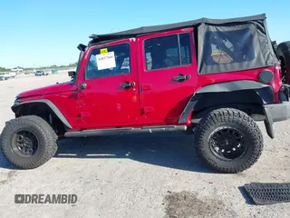 2008 Jeep Wrangler Unlimited X with VIN 1J4GB391X8L649234, listed as a IAAI auction lot 41837164 with 154,035 mi miles and . Bid and sale history available at DreamBid. Image 14.