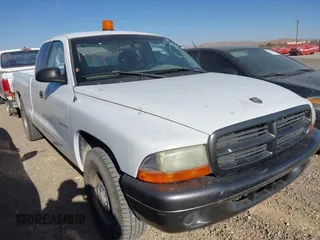 2002 Dodge Dakota with VIN 1B7GL12X32S701273, listed as a IAAI auction lot 41552573 with 157,212 mi miles and . Bid and sale history available at carsss.com. Image 12.