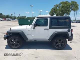 2013 Jeep Wrangler Sport with VIN 1C4AJWAG0DL542624, listed as a IAAI auction lot 42590160 with 54,850 mi miles and . Bid and sale history available at DreamBid. Image 14.