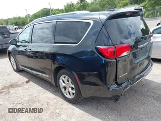 2020 Chrysler Pacifica Limited z VIN 2C4RC1GG5LR272593, wystawiony jako IAAI lot #42398809 z przebiegiem 96 957 mil mil oraz . Historia ofert i sprzedaży dostępna na DreamBid. Obrazek 3.