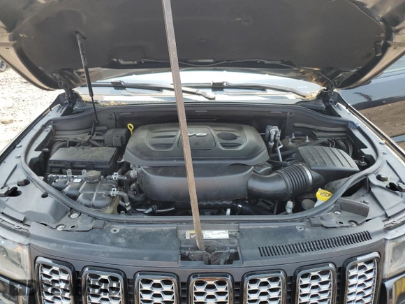 2017 Jeep Grand Cherokee Altitude with VIN 1C4RJFAG5HC892291, listed as a Copart auction lot 58579975 with 71,018 mi miles and Salvage title. Bid and sale history available at DreamBid. Image 12.