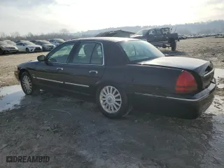 2011 Mercury Grand Marquis LS with VIN 2MEBM7FV0BX608564, listed as a Copart auction lot 48513095 with 128,241 mi miles and Salvage Title. Bid and sale history available at carsss.com. Image 2.