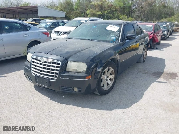 2006 Chrysler 300 Touring with VIN 2C3KA53G66H212129, listed as a IAAI auction lot 41868973 with 248,340 mi miles. Bid and sale history available at carsss.com. Image 2.