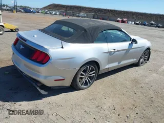2016 Ford Mustang EcoBoost Premium with VIN 1FATP8UHXG5243292, listed as a IAAI auction lot 42315552 with 106,753 mi miles and . Bid and sale history available at DreamBid. Image 4.