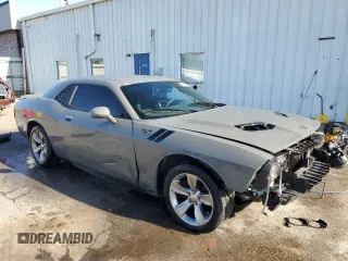 2019 Dodge Challenger SXT z VIN 2C3CDZAG2KH524724, wystawiony jako Copart lot #52202495 z przebiegiem 125 667 mil mil oraz Szkoda całkowita • Salvage title. Historia ofert i sprzedaży dostępna na DreamBid. Obrazek 4.