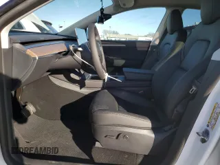 2025 Tesla Model Y Long Range with VIN 7SAYGDEDXSF228371, listed as a Copart auction lot 43925575 with 2,848 mi miles and Salvage Title. Bid and sale history available at DreamBid. Image 7.