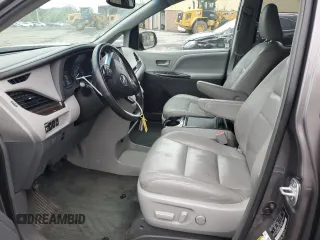 2015 Toyota Sienna XLE with VIN 5TDYK3DC4FS659692, listed as a Copart auction lot 57248355 with 121,644 mi miles and Salvage title. Bid and sale history available at DreamBid. Image 7.
